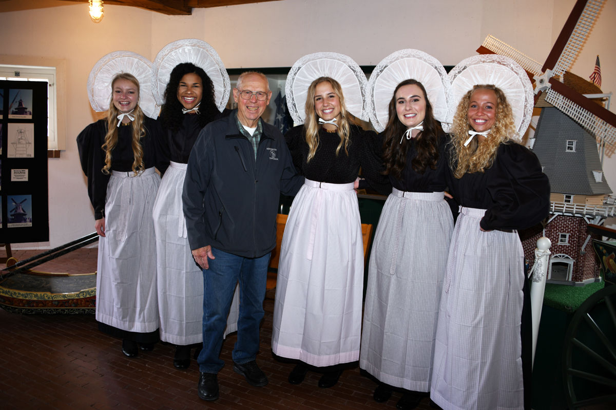 187 Arvid Janzen poses with Queen Olivia and her court.JPG